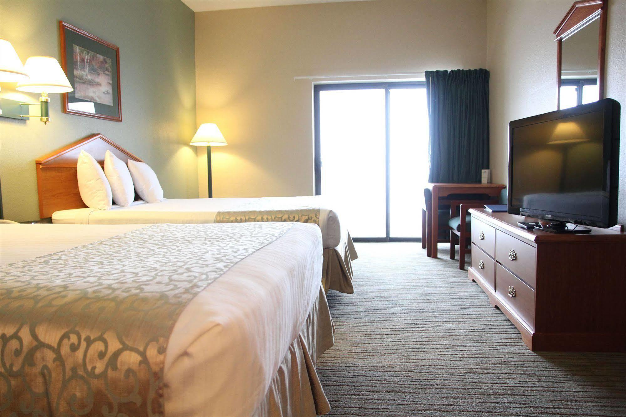 Beachfront Hotel Houghton Lake Exterior photo
